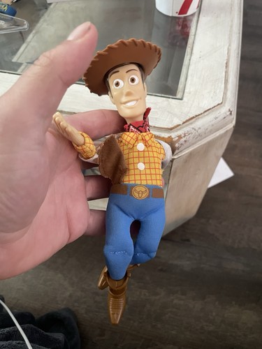 Woody doll from toy - woody, story
